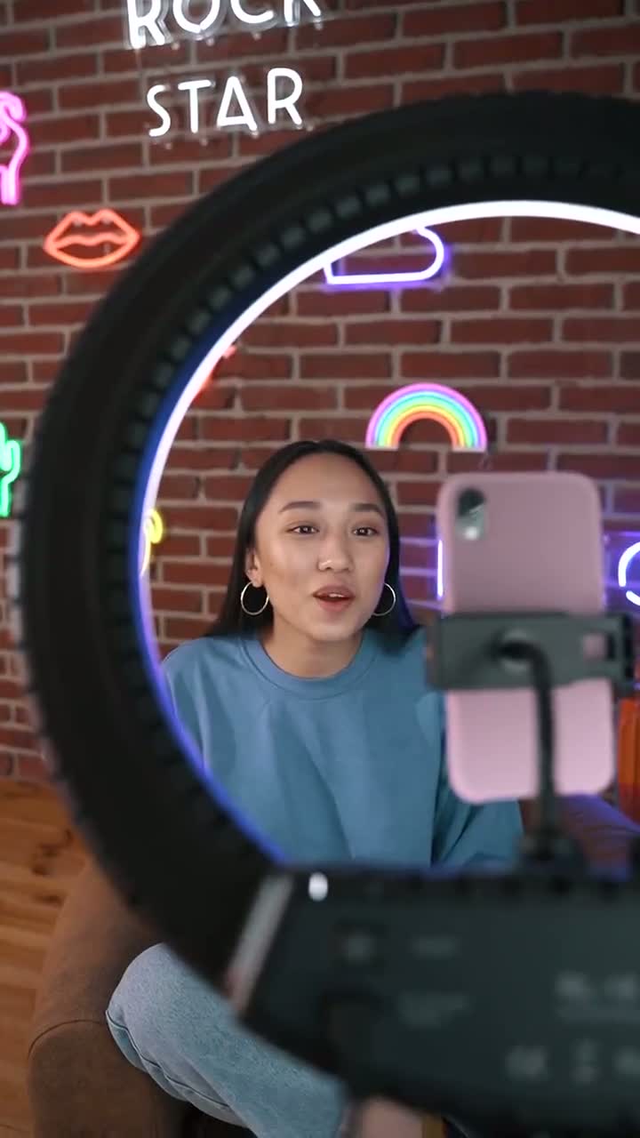 Creator recording a talking clip with a ring light